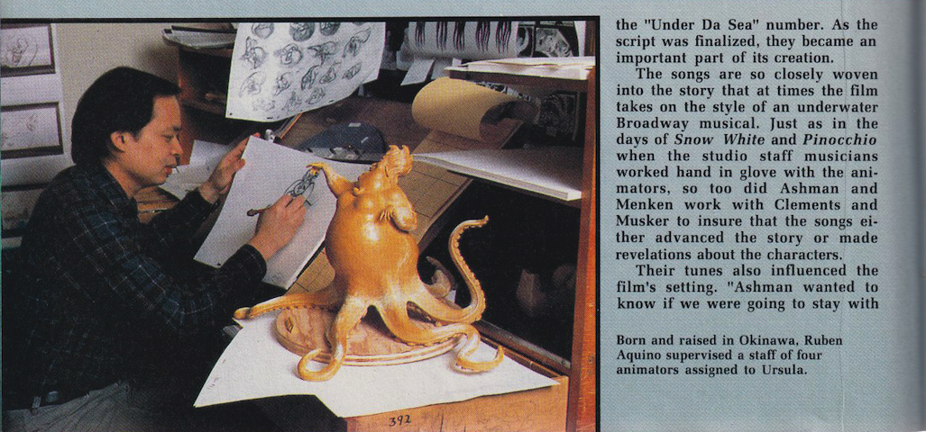 detail of page 38 of Comics Scene issue 11 (Feb. 1990), with a photo of Ruben Aquino drawing beside a sculpted maquette of Ursula; the photo caption reads “Born and raised in Okinawa, Ruben Aquino supervised a staff of four animators assigned to Ursula.”; some text of the Little Mermaid article is to the right of the photo